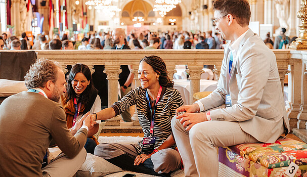 Impact Days @ViennaUP 2026 Four people talking in the Vienna City Hall on the first day of the Impact Days 2026