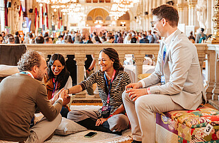 Impact Days @ViennaUP 2026 Four people talking in the Vienna City Hall on the first day of the Impact Days 2026